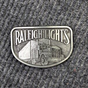 Vintage Raleigh Lights Belt Buckle Semi Trucker Big Rig Tobacco Advertising 80s